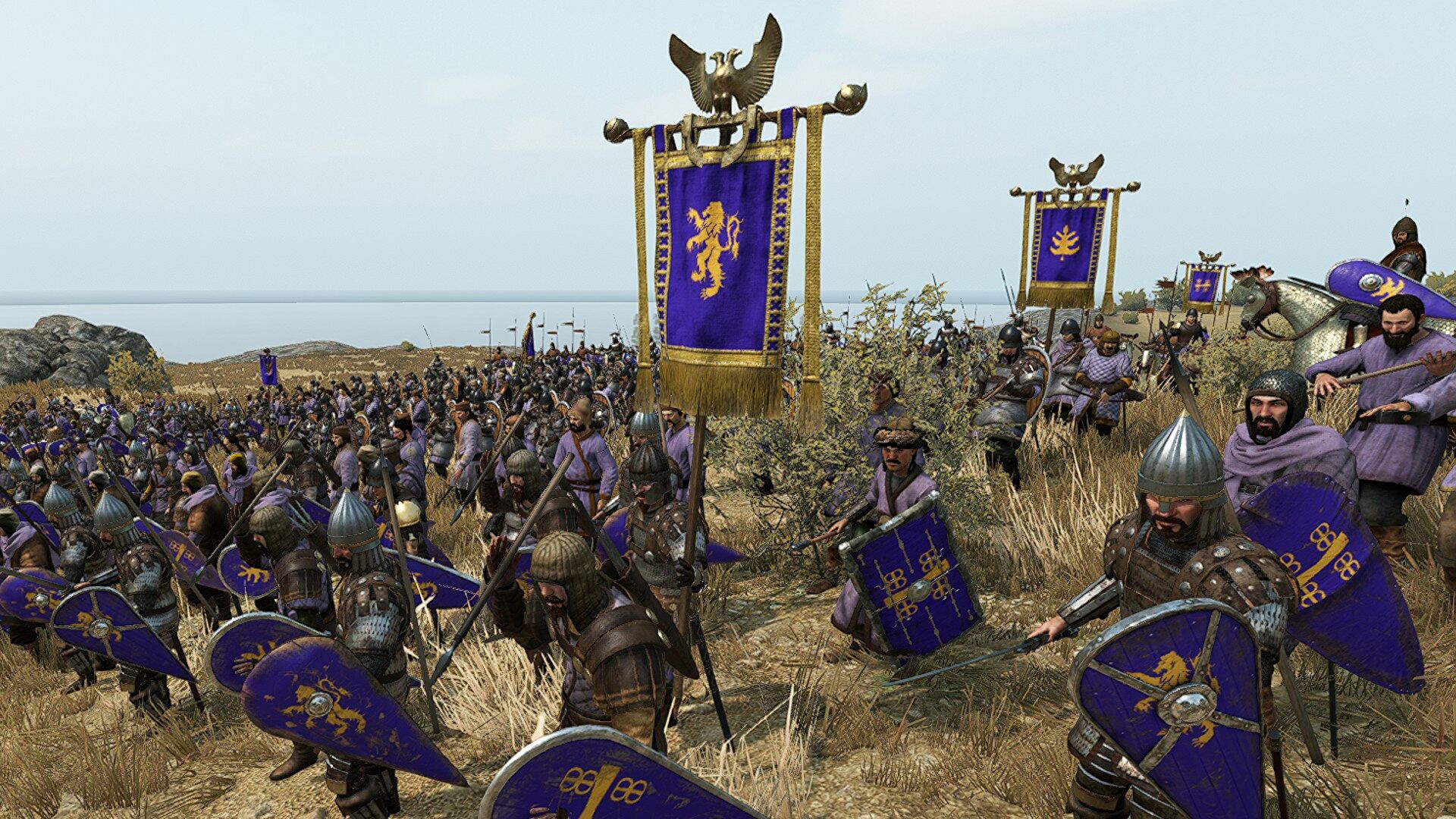Mount & Blade II : Bannerlord - une armée aux étendards violets sur le champs de bataille