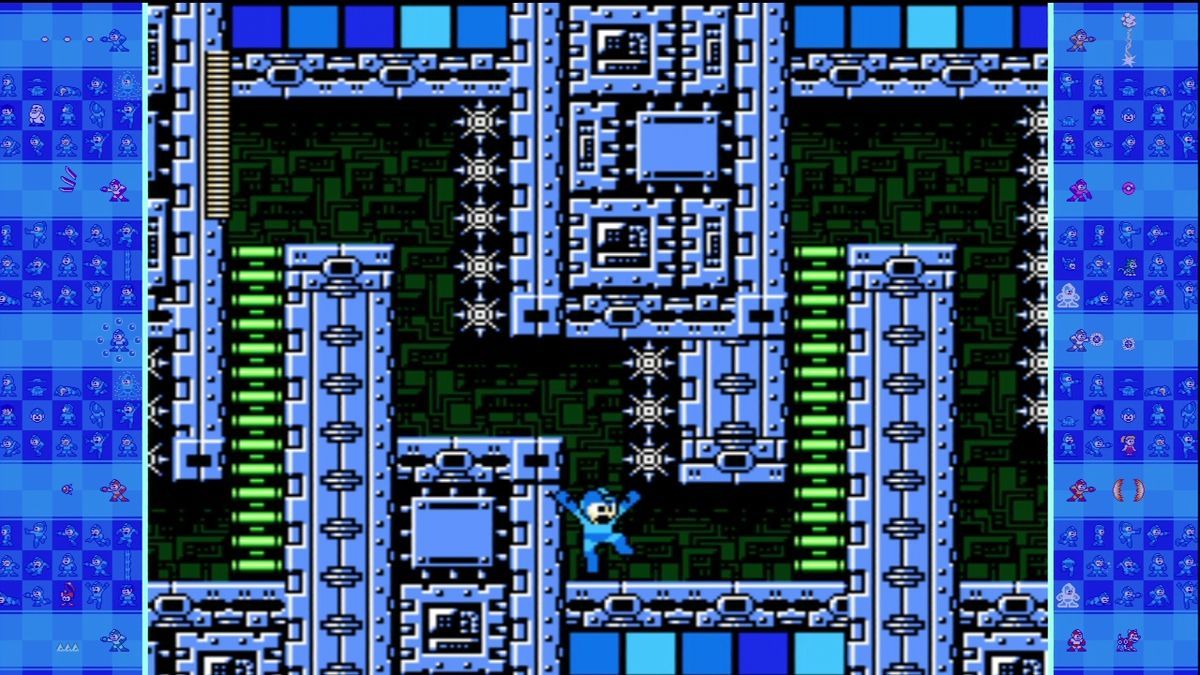 Mega Man tombe entre des pics et des échelles