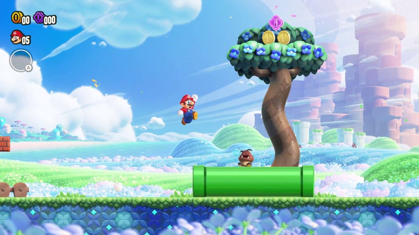 Mario saute sur un tuyau couché avec un goomba dessus