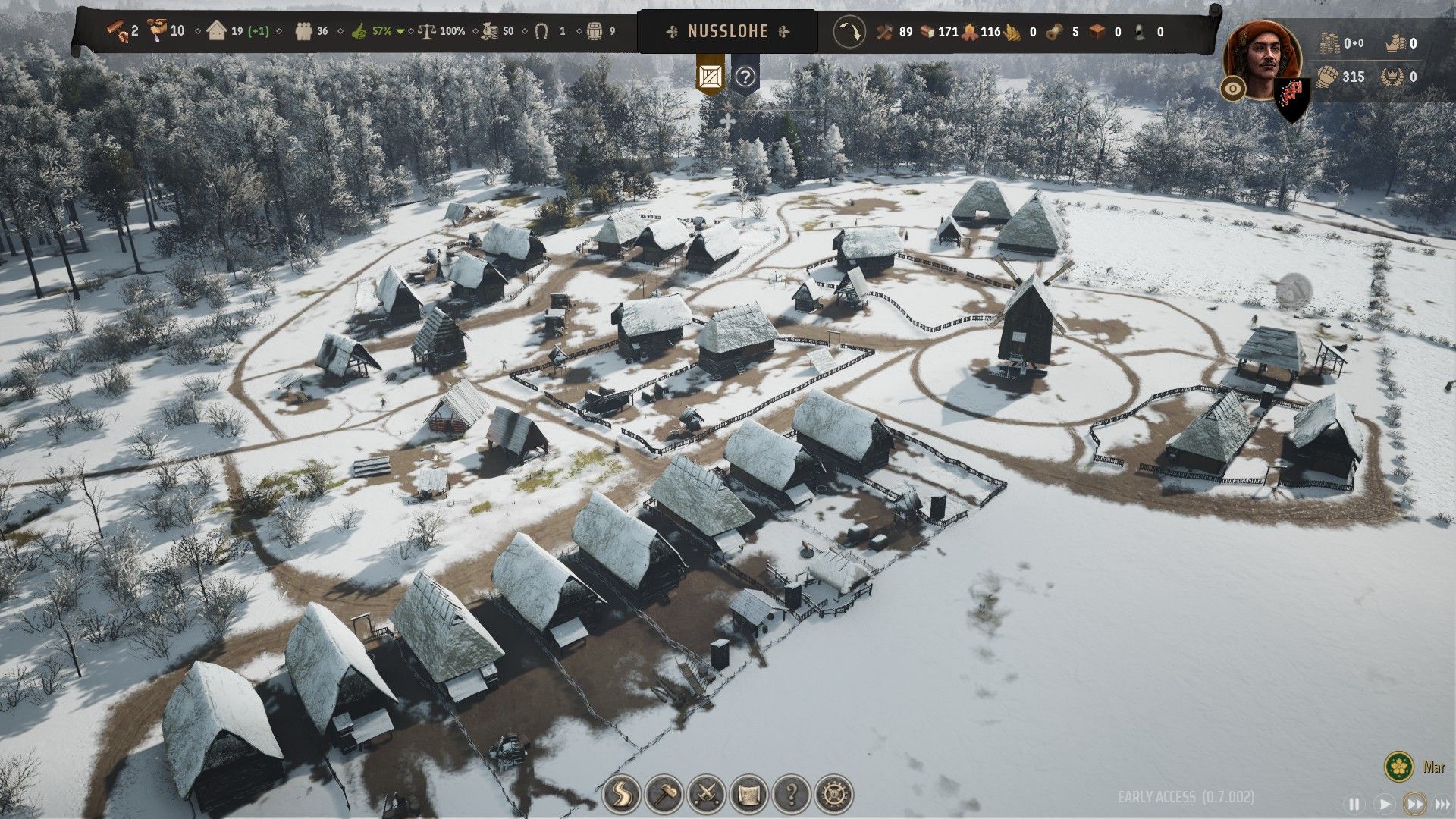 Manor Lords capture d'écran d'un village sous la neige